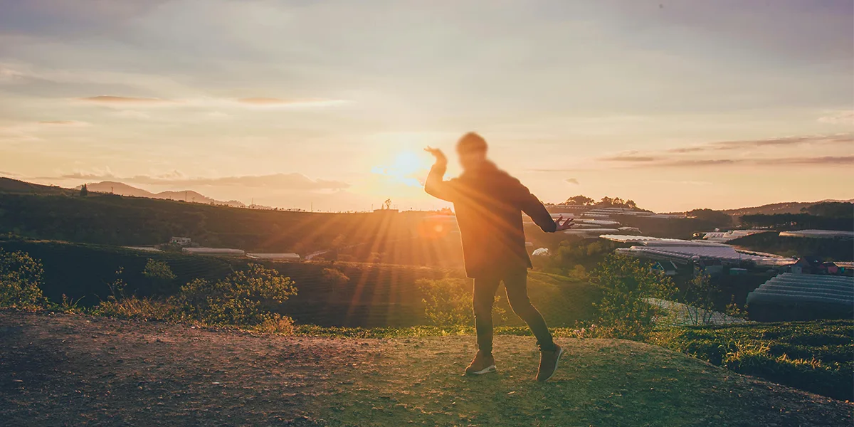 sunshine and a man on the mountain